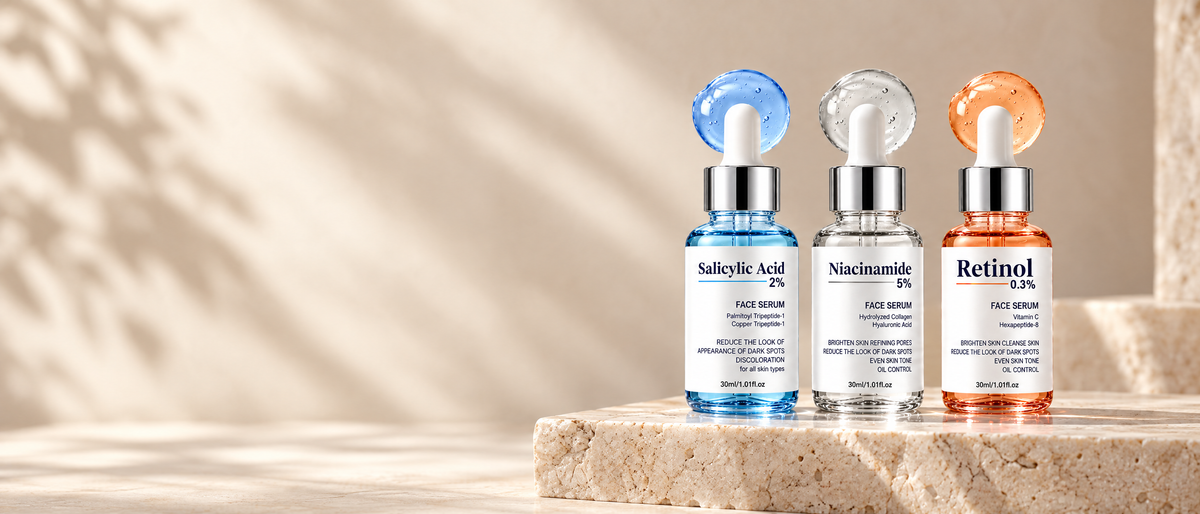 CosmaPharm Skin Renewal Serum Set on a travertine stone slab